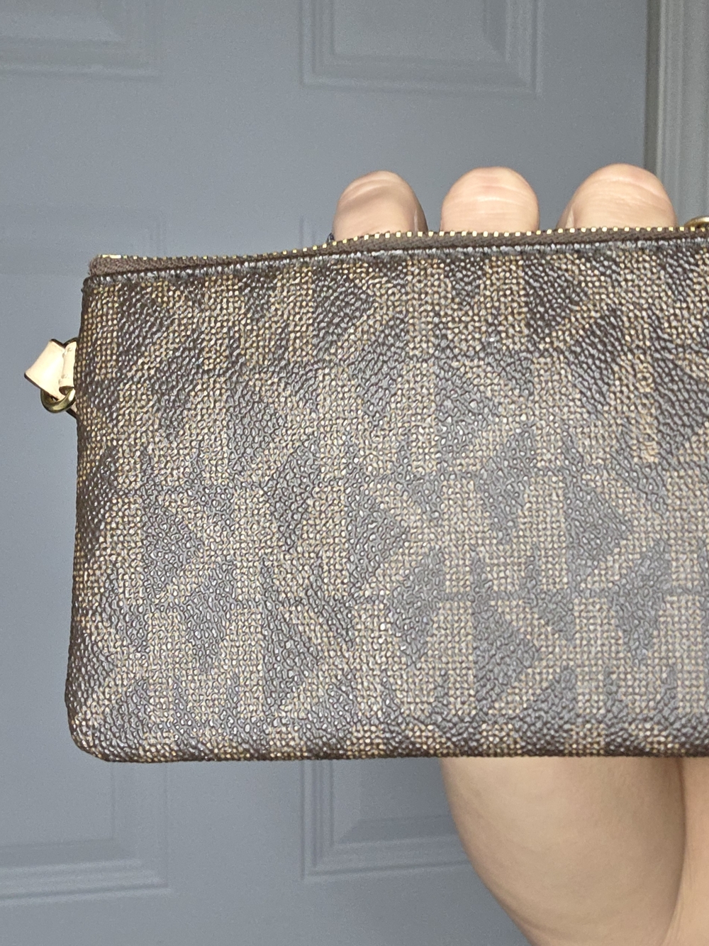 Michael Kors Brown Monogram Zip Wristlet with Gold Hardware